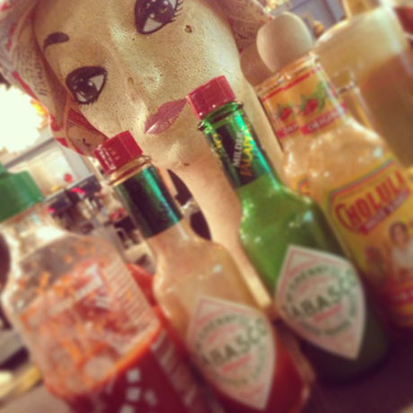 closeup of hot sauce bottles